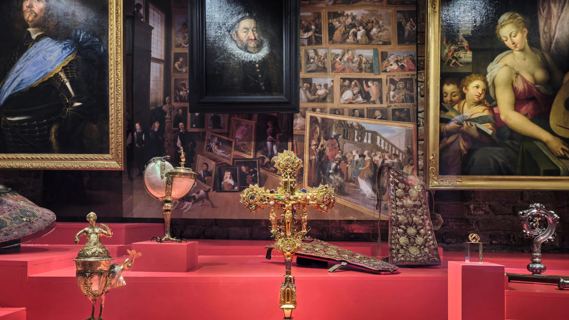 Installation with a gold cross and paintings