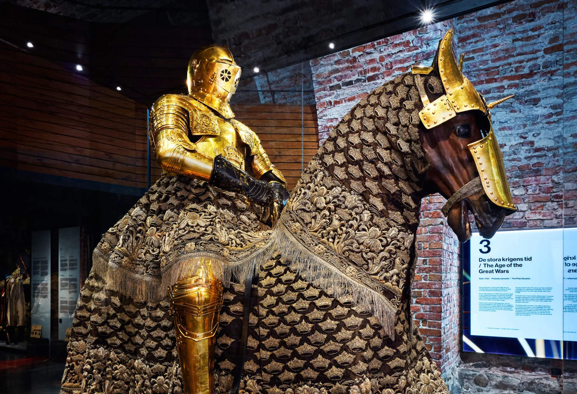 Image of Karl IX's golden armoury and and a golden plated horse.